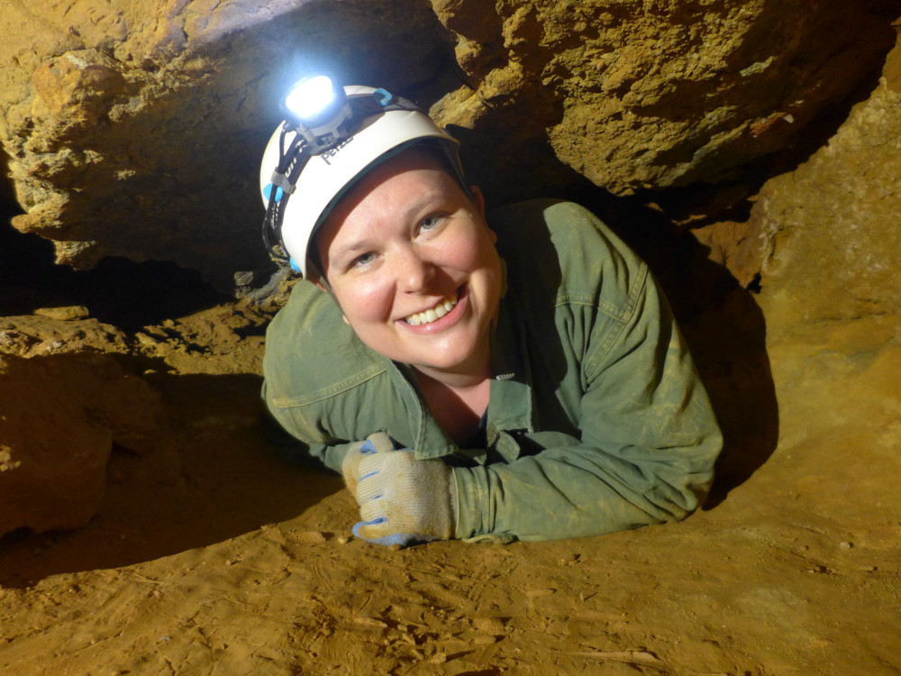 Beth in a crawl in Hamilton Cave